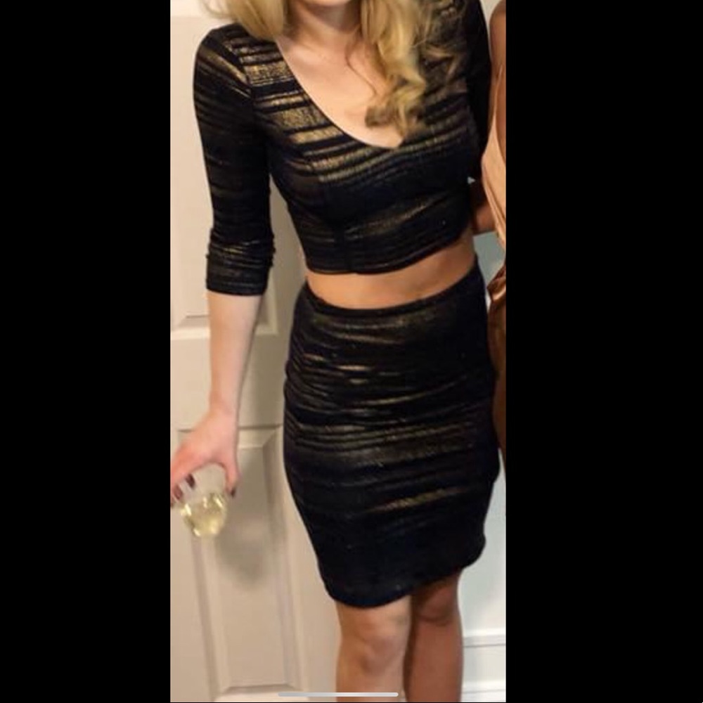 Navy and gold sparkled crop top and skirt